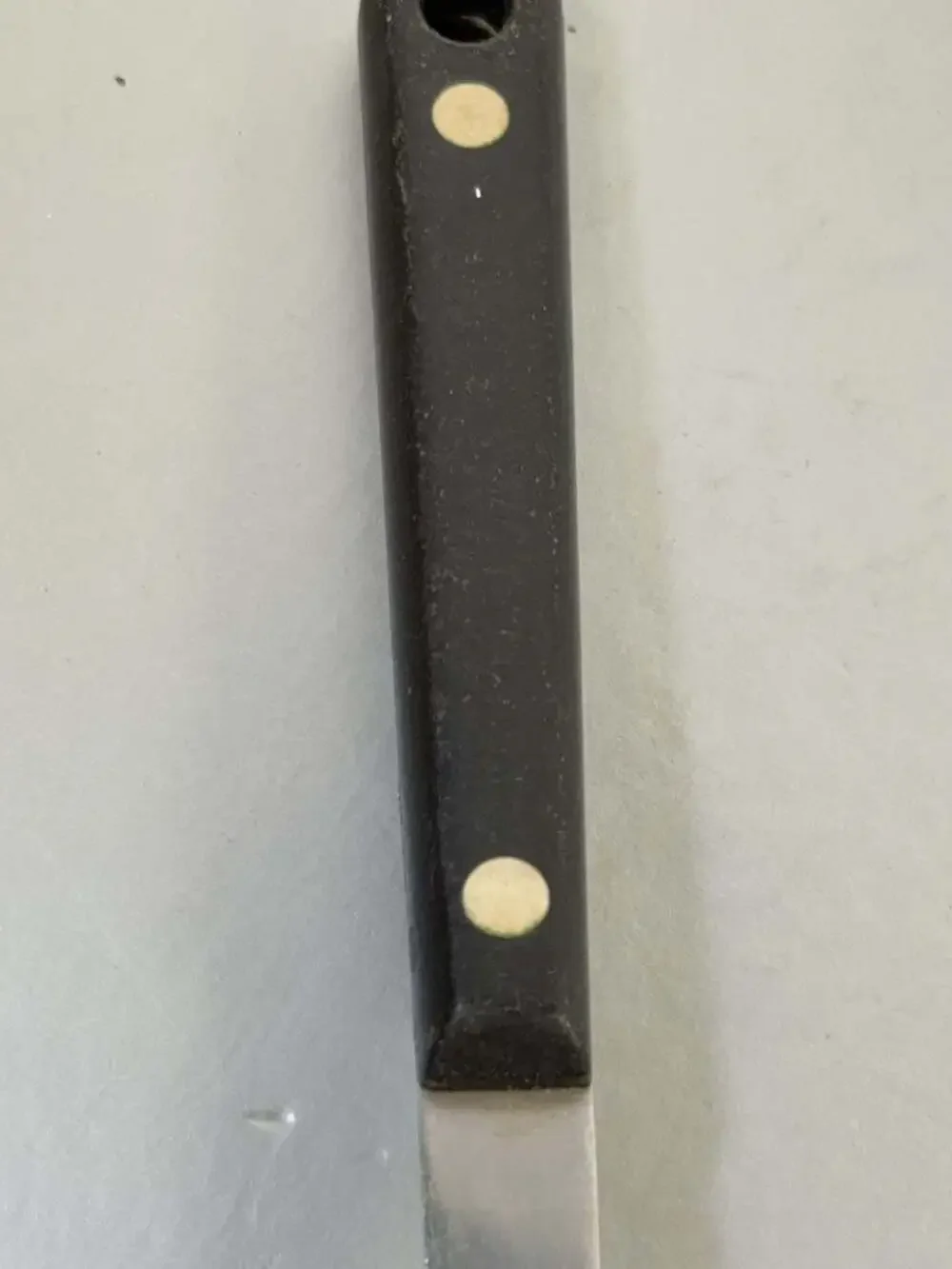 Vintage Ekco Stainless Vanadium Slotted Serving Spoon with Black Composite Handl